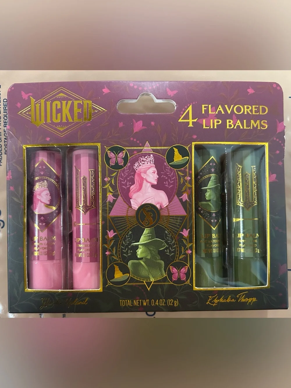 Wicked 4 Lip Balm Set. TASTE BEAUTY. 2 Glinda, 2 Elphaba. NWT. Universal Stud.